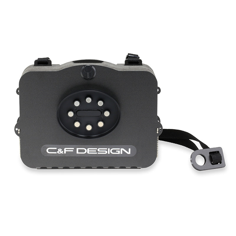 The C&F CFA-830 closed and front-on — the oval neodymium magnetic patch and low-profile shell that rides flat and high on your chest